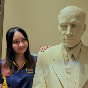 Ann with a statue of George Hormel