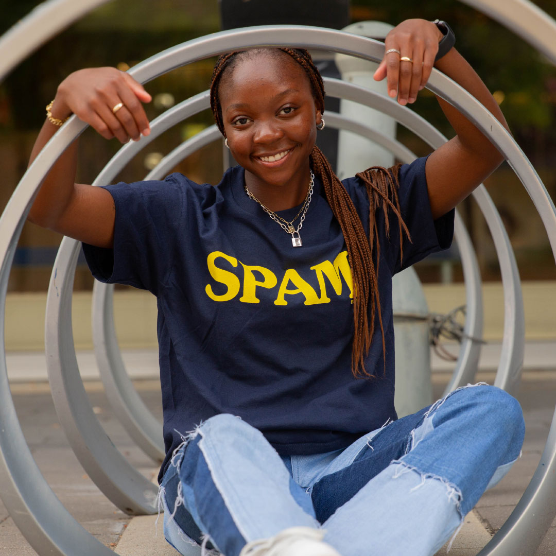 Person wearing a SPAM shirt.